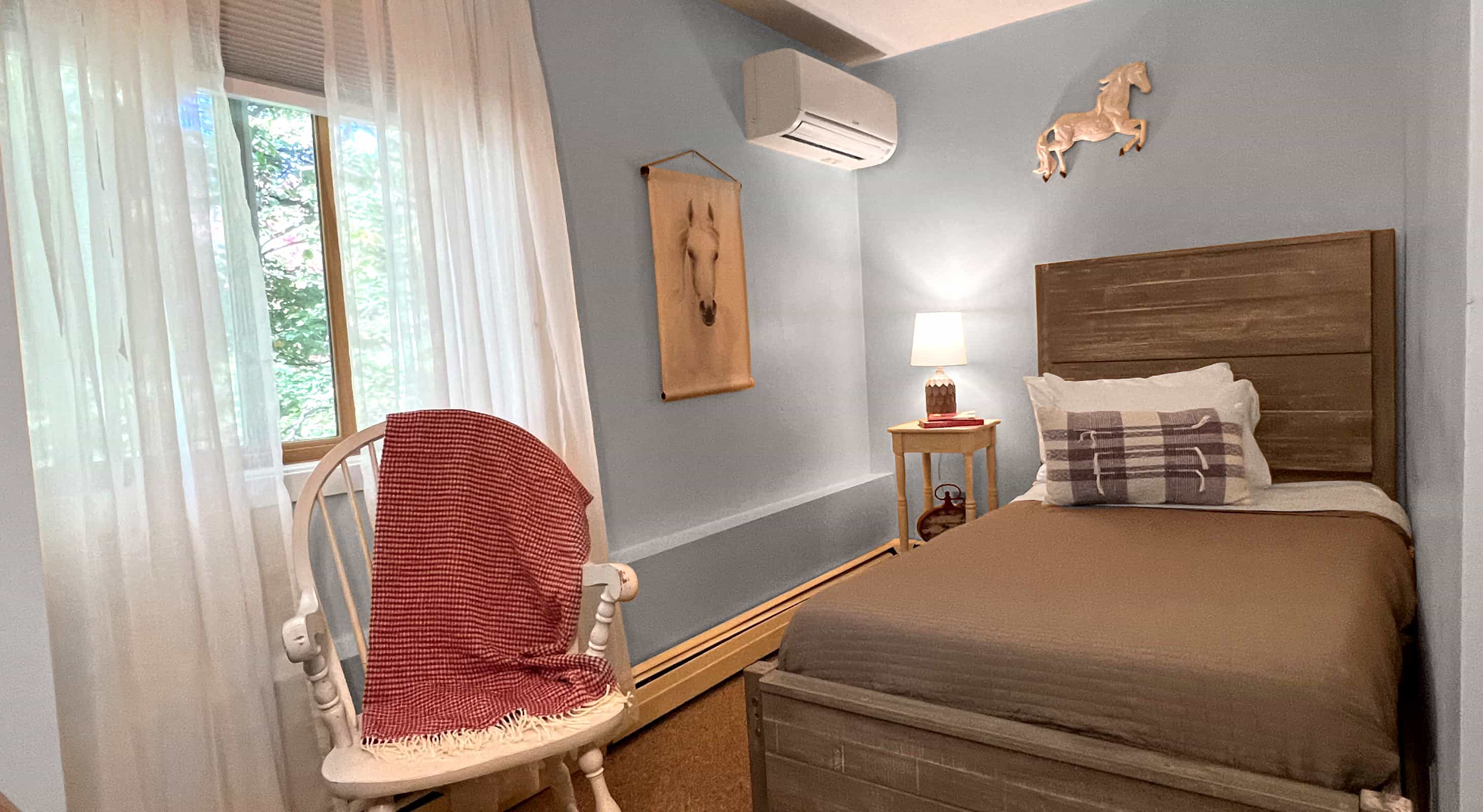 Twin bed at family friendly Waitsfield hotel