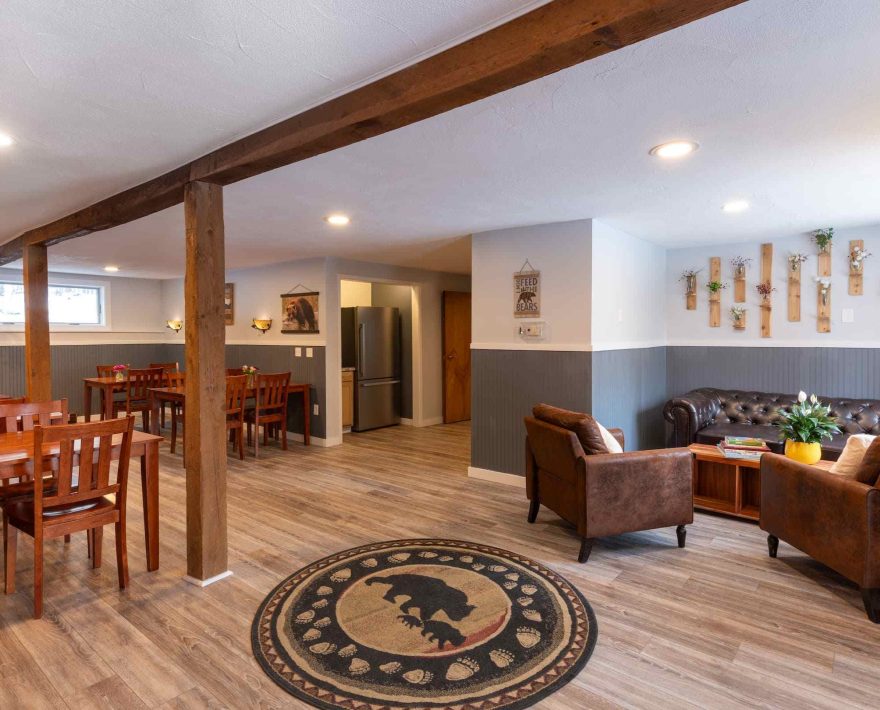 Dining area with dining tables and lounge seating at White Horse Lodge in Vermont