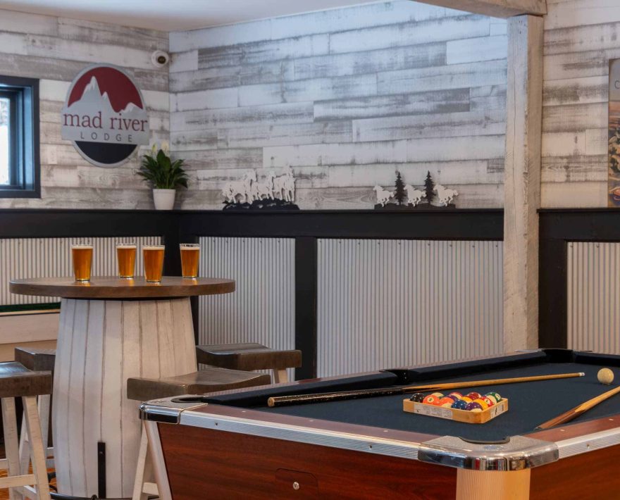 Billiards table and bar seating in White Horse Lodge Game Room